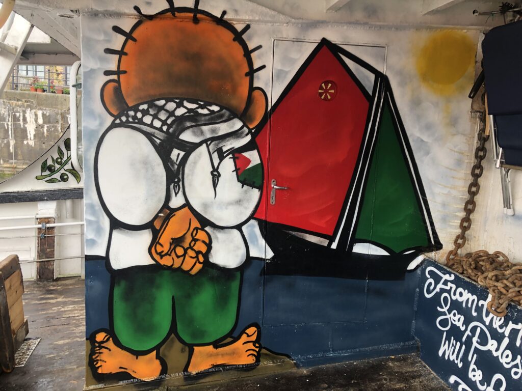 Handala graffiti onboard